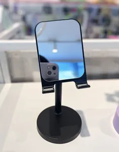 Long phone holder with built in mirror